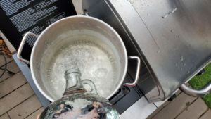 Pouring water into the brew kettle
